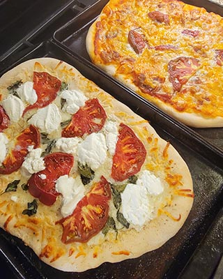 Two homemade pizzas